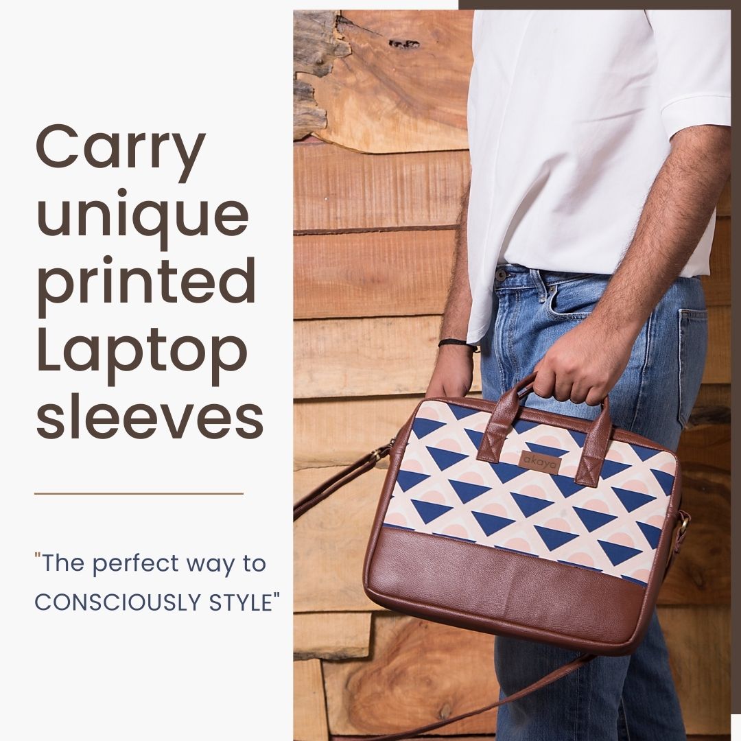 On the left side, bold text reads 'Carry unique printed laptop sleeves,' followed by 'the perfect way to consciously style.' On the right, a man in a white shirt and blue jeans holds our laptop bag against a backdrop of a wooden wall.