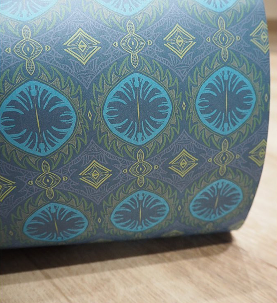 roll view of Blue Farmhouse hand-painted wallpaper, inspired by a serene tale of nature, brings a peaceful ambiance to your walls like sunlight filtering through trees.